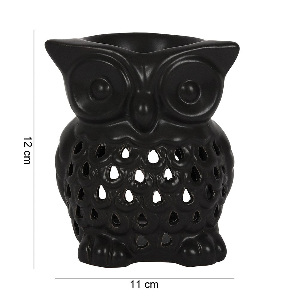 Black owl-shaped ceramic wax burner with a hollowed-out body showing cutout details, shown with dimension lines indicating 12 cm height and 11 cm width on a white background.