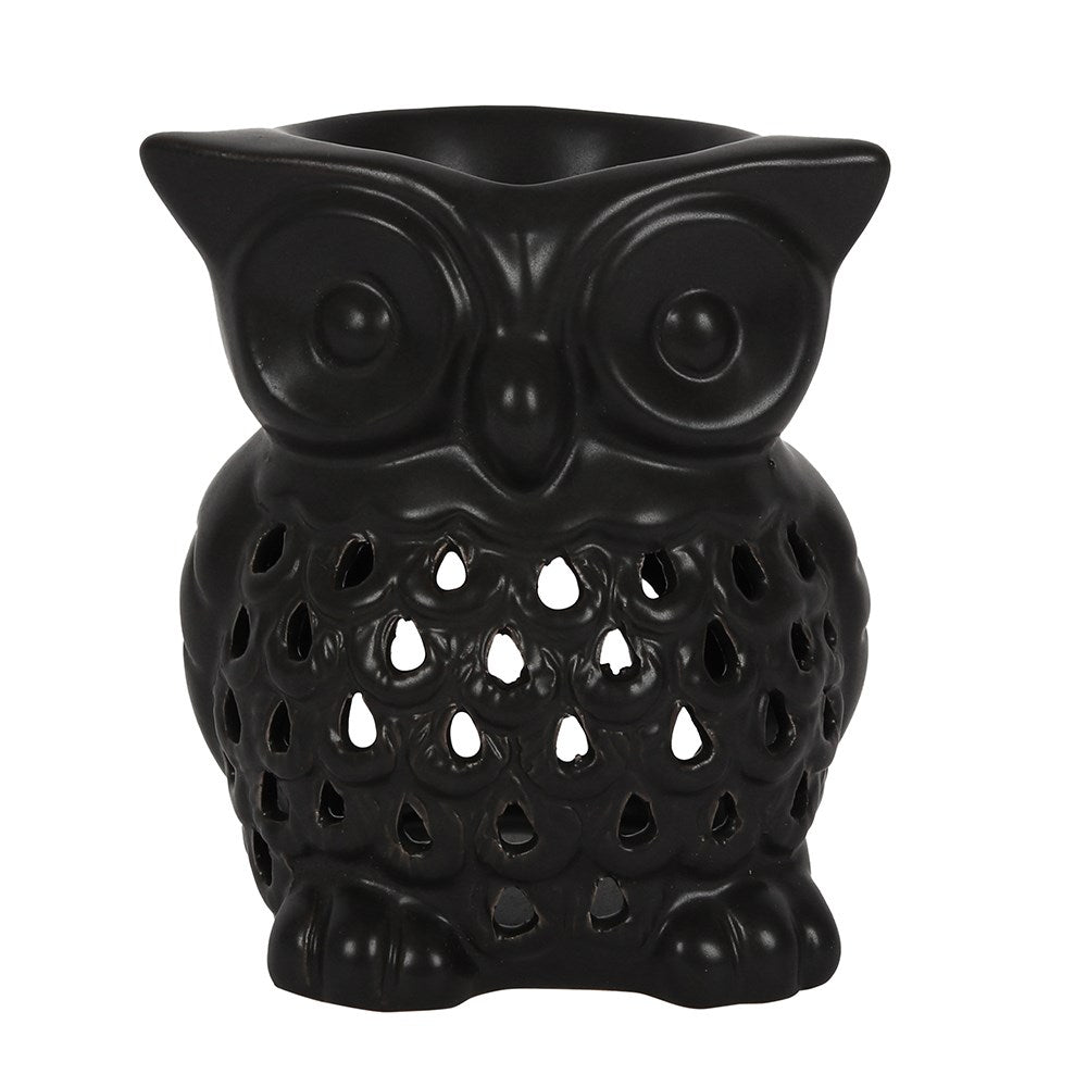 Black owl-shaped ceramic oil burner on a white background